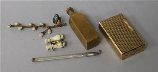 A painted bronze bird on a branch(a.f.) a pair of Binoculars Stanhope, Dupont lighter , silver swizzle stick and treen bottle box